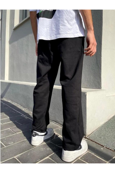 UYN SPORT Μαύρη αθλητική φόρμα Unisex από ύφασμα ελαφρύ νήματα M