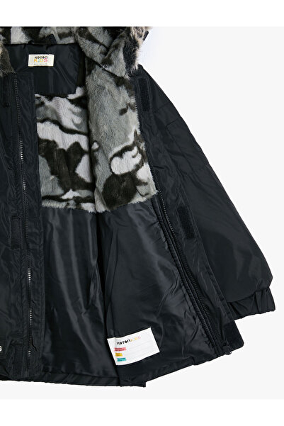 Koton Uzun Şişme Mont Suni Kürk Detaylı Kapşonlu Fermuarlı Cepli