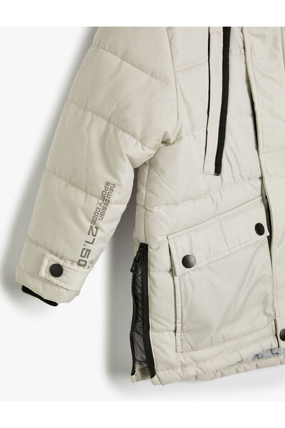 Koton Větruodolný kožich s kapucí a kapsami