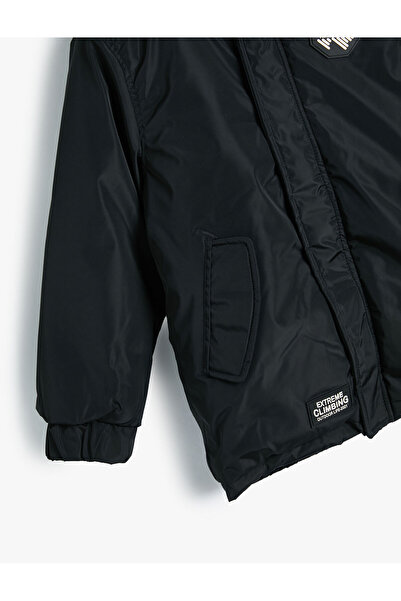 Koton Uzun Şişme Mont Suni Kürk Detaylı Kapşonlu Fermuarlı Cepli