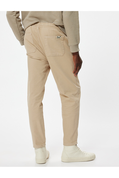 Koton Hose aus Baumwollgabardine – Schnürung an der Taille und Taschendetail