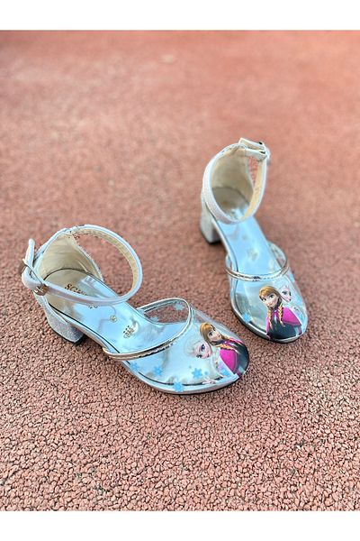 NS Little Třpytivé průhledné vysoké podpatky Elsa