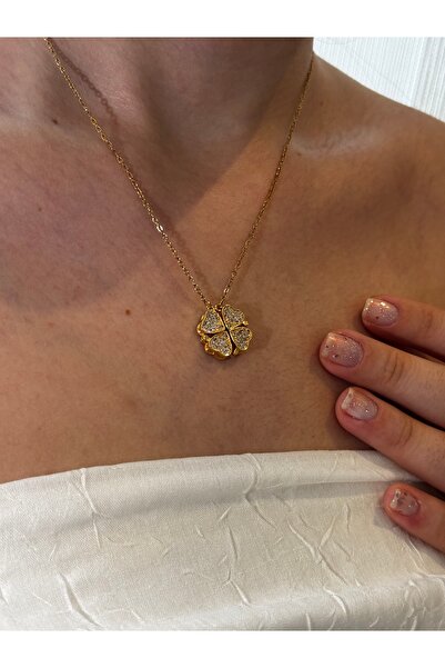 Asiaksesuar Yonca şeklinde taşlı gold rengi çelik küpe