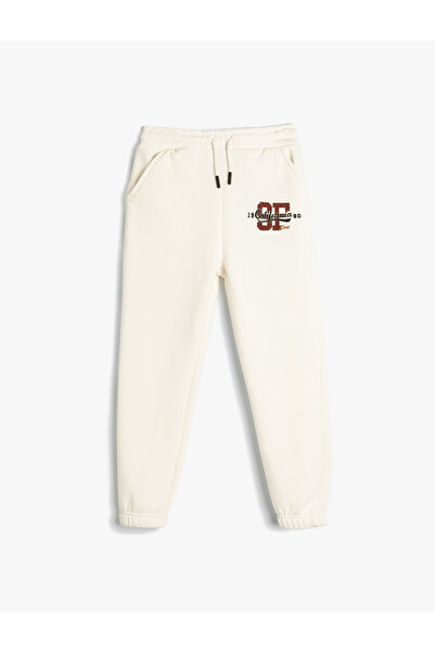 Koton Jogger Eşofman Altı Beli Bağlamalı Baskı Detaylı Şardonlu