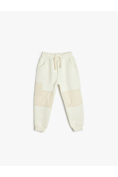 Koton Jogger-Jogginghose, Taillenschnürung, Farbblock-Taschendetail, Rosette