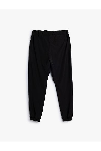 Koton Sport-Jogginghose aus Fallschirmstoff – elastische Taille, Reißverschlusstasche