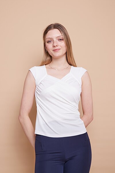 Jument ελαστικό ύφασμα Κομψό ύφασμα κρεπ διπλό πέτο με περιτυλιγμένο μπροστινό μέρος με πτερύγιο πεταλούδας και μανίκια μπλούζα-κρέμα