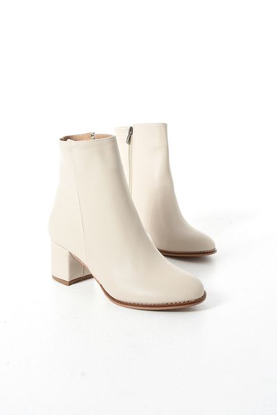 Gökçe Shoes حذاء نسائي ذو كعب بيضاوي كريمي من Raisel للاستخدام اليومي