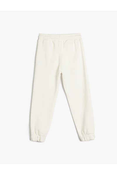 Koton Cotton Blended Jogger Sweatpants - Slogan Printed, Lace-up Waist and Pocket Detail