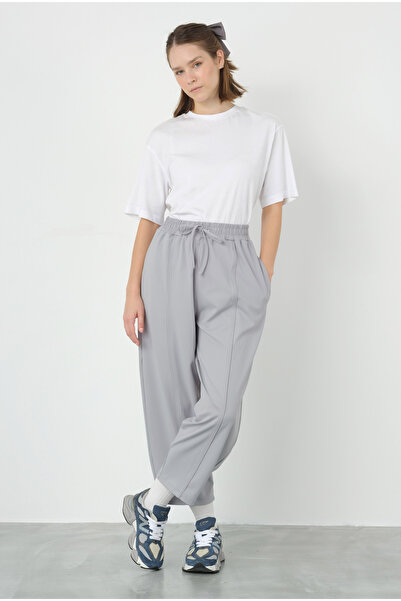 HEQA Світло-сірі штани з вставками