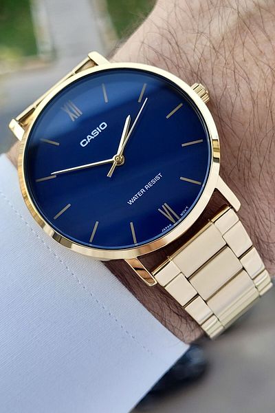Casio Men's Wristwatch with Navy Blue Dial and Gold Color Cord, 2 Years Warranty