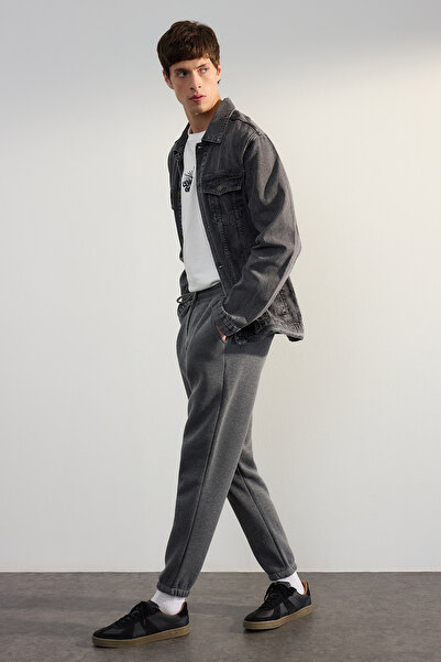 Trendyol Collection Antracitové melanžové unisexové tepláky Regular/Regular Cut Elastické vnitřní fleecové tepláky TMNAW22EA0346