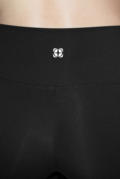 Trendyol Collection Černá měkká kartáčovaná tkanina Reflexní potisk Detailní pletené sportovní legíny po celé délce Thmaw25Ty00020