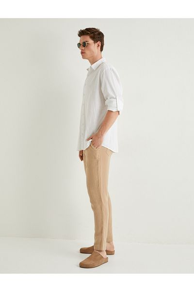 Koton Letné nohavice z mušelínu Skinny Leg - šnurovanie v páse a detail vrecka