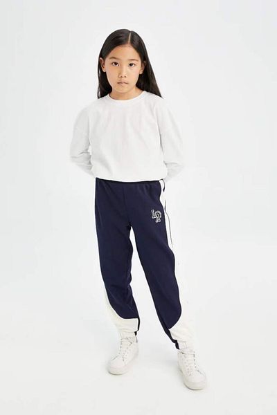 DeFacto Marineblaue Jogger-Jogginghose für Mädchen mit bedrucktem Bund und elastischem Bein 3153805