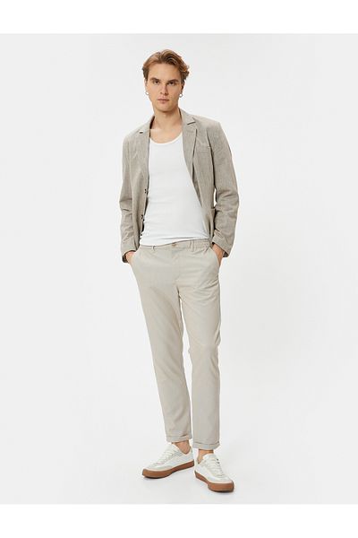 Koton Stoffhose Slim Fit, elastische Taille, geknöpfte Tasche, detailliertes, gefaltetes Bein