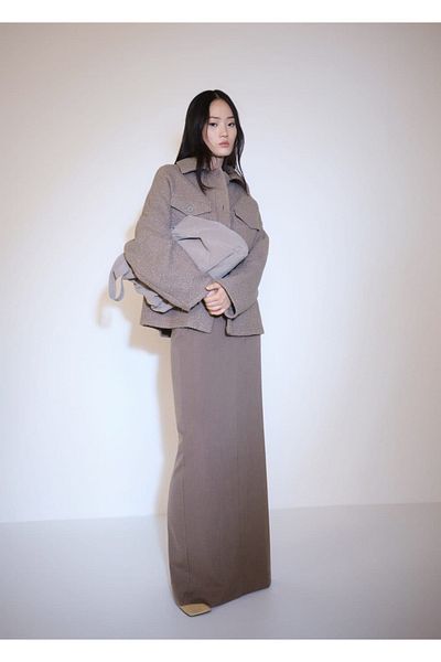 MANGO Woman Boucle bunda s kapsami