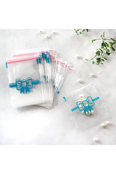 Bimotif Mavi Fiyonk Desenli Bantlı Şeffaf Poşet 10x15 Cm (100 Adet)