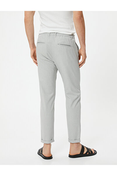 Koton Fabric Trousers Slim Fit Elastic Waist Buttoned Pocket Detailed Layered Leg
