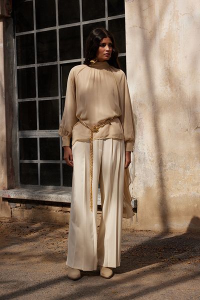Trendyol Modest Beigefarbene, plissierte Webhose – X AI TCTAW25TP00000