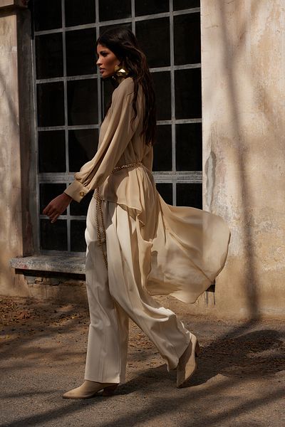 Trendyol Modest Beigefarbene, plissierte Webhose – X AI TCTAW25TP00000