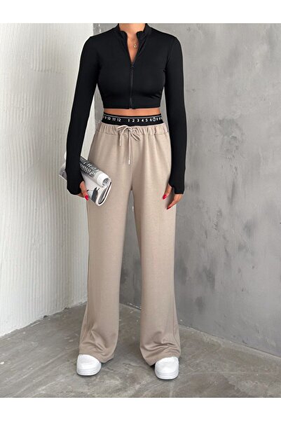 KAŞİHA KADIN MODAL KUMAŞ GENİŞ KESİM BOL PAÇA  EŞOFMAN  ÇİFT CEPLİ BELİ DETAYLI