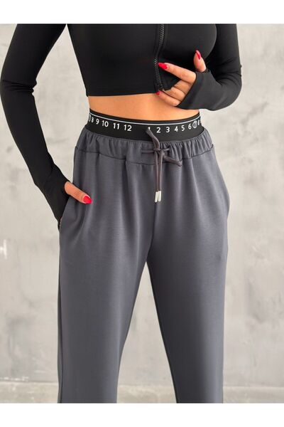 KAŞİHA KADIN MODAL KUMAŞ GENİŞ KESİM BOL PAÇA  EŞOFMAN  ÇİFT CEPLİ BELİ DETAYLI