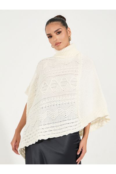 Styli Textured Knit Turtle Neck Sweater with Asymmetric Hem