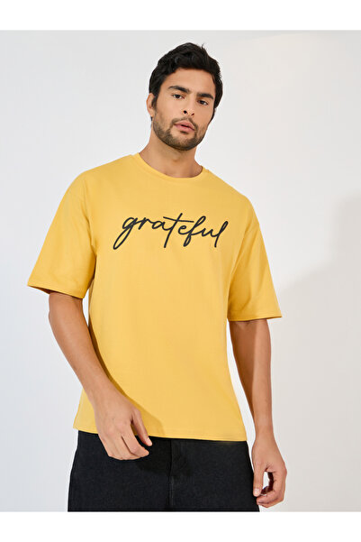 Styli تي شيرت كبير الحجم مطبوع عليه عبارة "شكرًا"