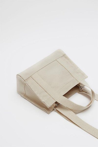 Madamra Krémová dámská crossbody plátěná taška