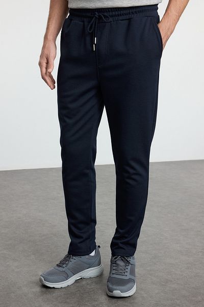 Trendyol Collection Hellmarineblaue, strukturierte Jogginghose – Schnür-Taille TMNSS24PL00027