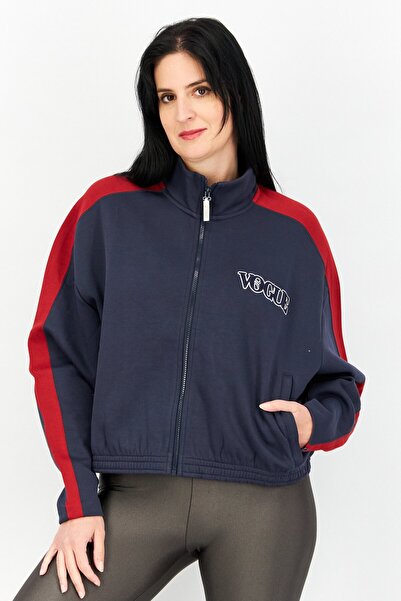 Puma سترة تدريب نسائية بمقاس عادي وأكمام طويلة وسحاب كامل، لون أزرق داكن