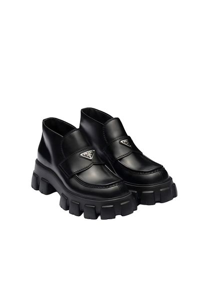 Prada Sport حذاء مونوليث فلاتفورم من الجلد المصقول المزخرف بشعار