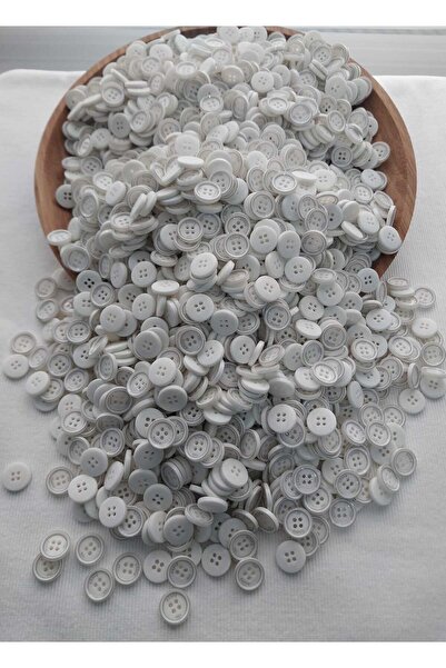 Tasarım أزرار بوليستر منقوشة باللون الأبيض الفاتح بقطر 1.5 سم 20 قطعة.