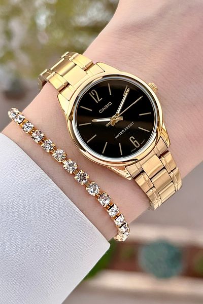 Casio Women Wrist Watch with Dial Black Cord Gold Color 2 Years Guarantee