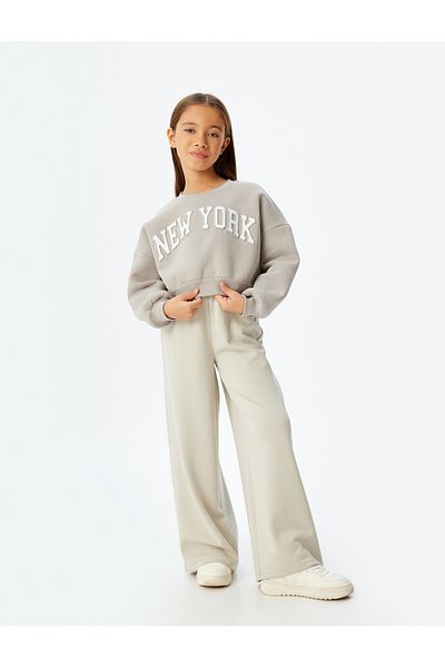 Koton Übergroßes, kurzes Sweatshirt – Rundhalsausschnitt, erhabene Baumwollmischung, aufgedruckter Slogan