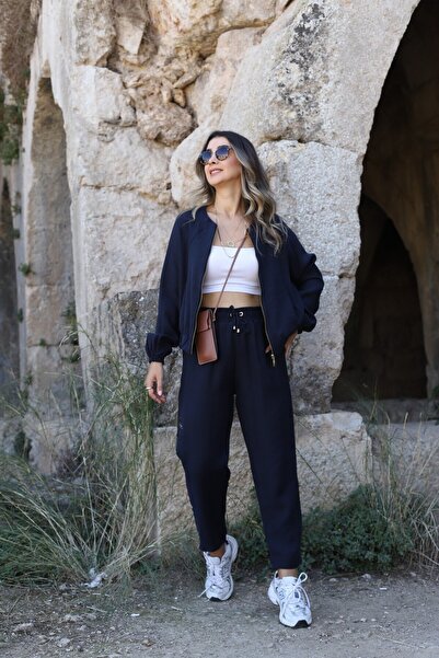 bytugcekaya طقم بنطلون جاكيت بسحاب باللون الأزرق الداكن