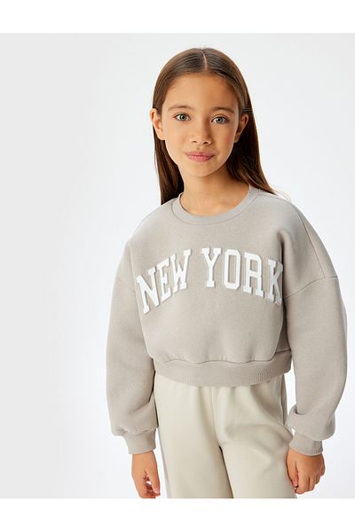 Koton Übergroßes, kurzes Sweatshirt – Rundhalsausschnitt, erhabene Baumwollmischung, aufgedruckter Slogan