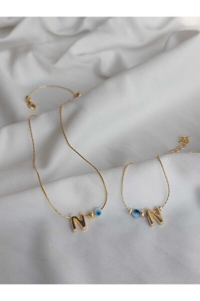 bijoux uniques طقم قلادة وسوار مطلي بالذهب غير قابل للتشويه مع تفاصيل خرزة عي...