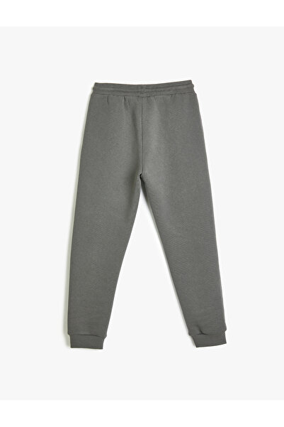 Koton Slogan Baskı Detaylı Cepli Beli Bağlamalı Şardonlu Jogger Eşofman Altı