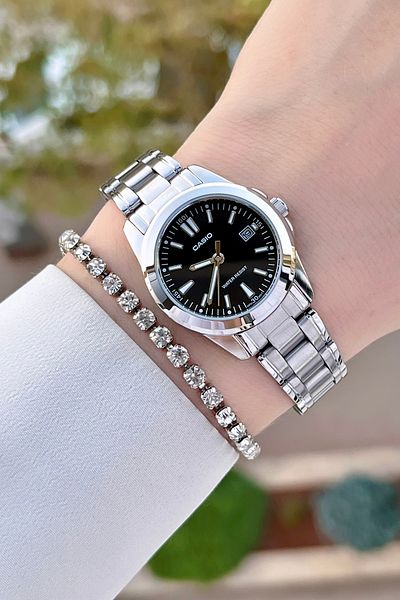 Casio Women's Wristwatch with Black Cord and Metallic Color