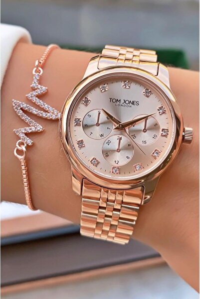 Tom Jones Mrd12238 ساعة يد نسائية باللون الذهبي الوردي مع سوار هدية