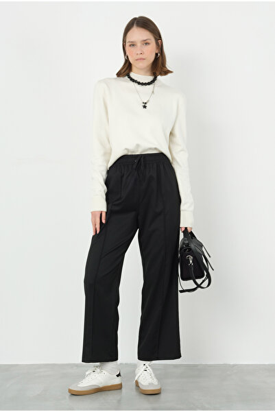 HEQA Чорні штани - з деталями швів спереду