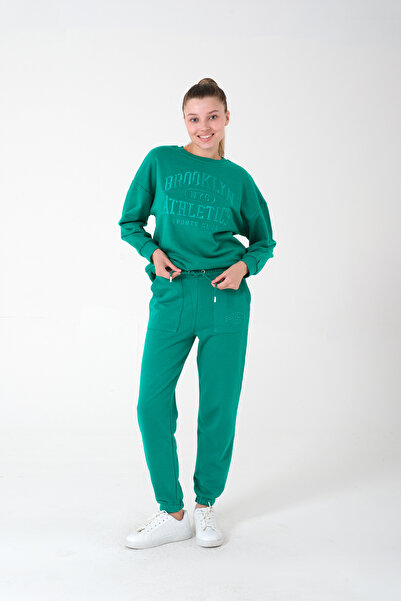 Kyron Πράσινη γυναικεία φόρμα - με τσέπες και μανσέτες
