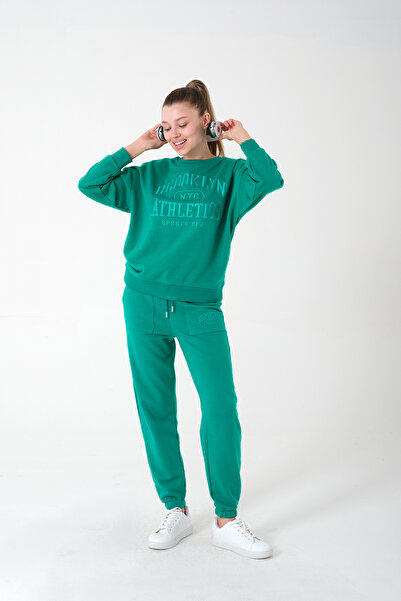 Kyron Πράσινη γυναικεία φόρμα - με τσέπες και μανσέτες