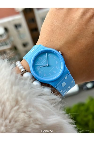 Q&Q 10 Bar Waterproof Polka Dot Women's Wristwatch with Blue Silicone Cord - Suitable for Pool and Sea