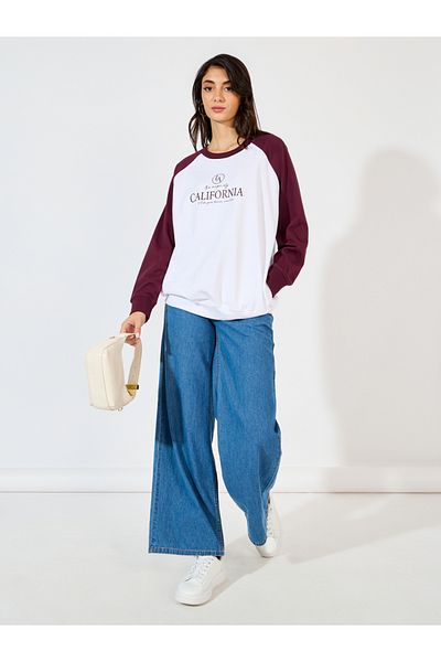 Styli Oversized Longline Slogan Print Sweatshirt