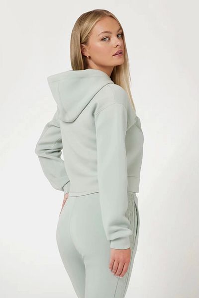 Guess سويت شيرت نسائي أبيض بشعار مثلث