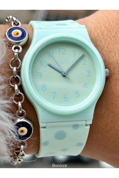Q&Q Baby Green Silicone Cord - 10 Bar Waterproof, Numeral Polka Dot Women's Wristwatch