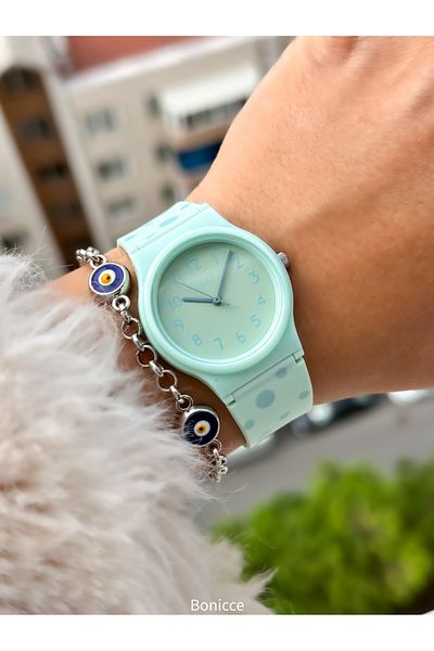 Q&Q Baby Green Silicone Cord - 10 Bar Waterproof, Numeral Polka Dot Women's Wristwatch